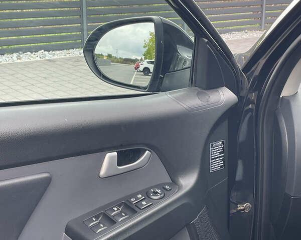 Черный Киа Sportage, объемом двигателя 1.7 л и пробегом 235 тыс. км за 12299 $, фото 15 на Automoto.ua