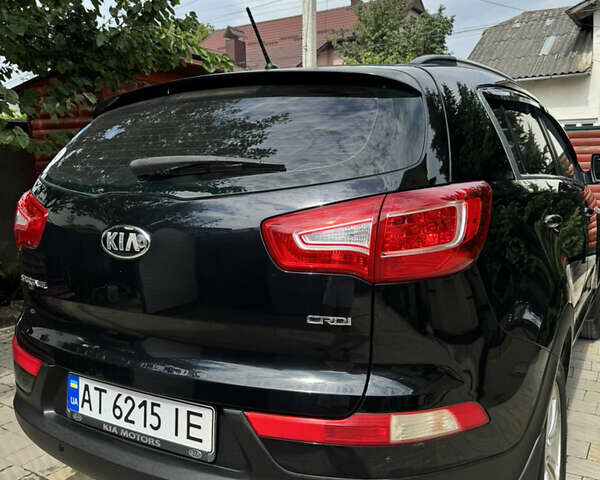 Чорний Кіа Sportage, об'ємом двигуна 1.7 л та пробігом 219 тис. км за 11200 $, фото 4 на Automoto.ua