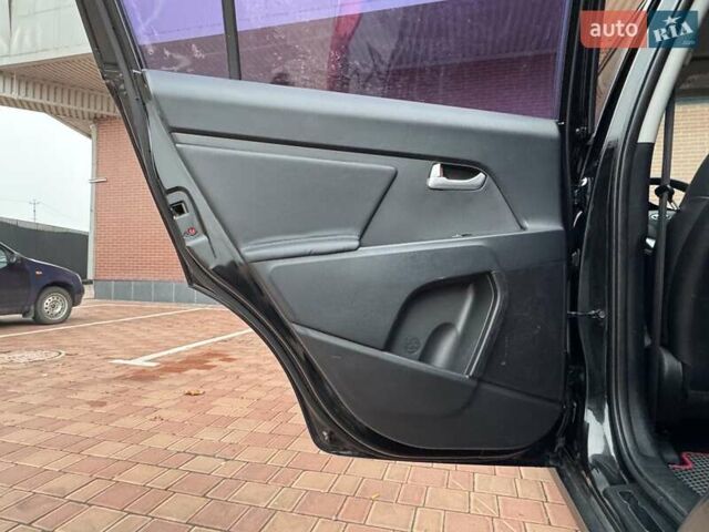 Черный Киа Sportage, объемом двигателя 2 л и пробегом 180 тыс. км за 13300 $, фото 48 на Automoto.ua