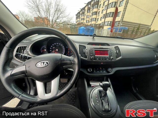 Чорний Кіа Sportage, об'ємом двигуна 2 л та пробігом 105 тис. км за 12500 $, фото 2 на Automoto.ua