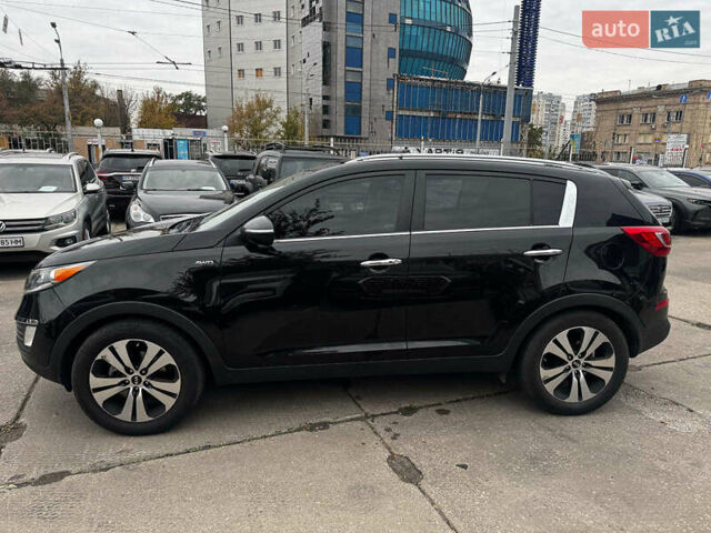 Черный Киа Sportage, объемом двигателя 2.4 л и пробегом 173 тыс. км за 12990 $, фото 3 на Automoto.ua