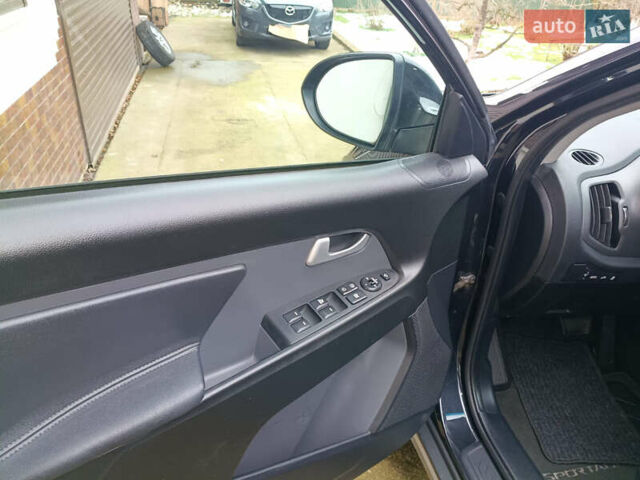 Черный Киа Sportage, объемом двигателя 2 л и пробегом 209 тыс. км за 14599 $, фото 31 на Automoto.ua