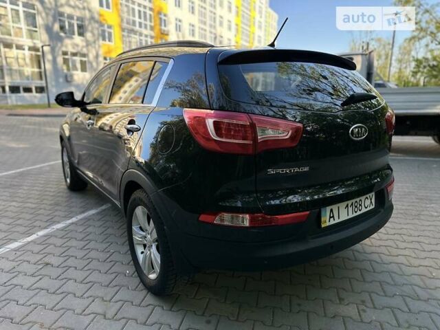 Чорний Кіа Sportage, об'ємом двигуна 2 л та пробігом 207 тис. км за 11800 $, фото 9 на Automoto.ua