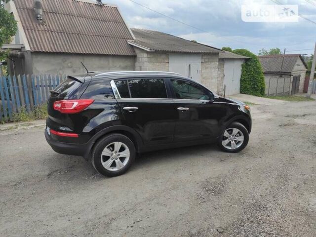 Черный Киа Sportage, объемом двигателя 2.4 л и пробегом 112 тыс. км за 12900 $, фото 3 на Automoto.ua