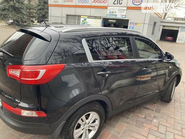 Чорний Кіа Sportage, об'ємом двигуна 2 л та пробігом 200 тис. км за 13200 $, фото 2 на Automoto.ua