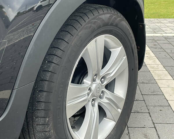 Черный Киа Sportage, объемом двигателя 1.7 л и пробегом 235 тыс. км за 12299 $, фото 30 на Automoto.ua
