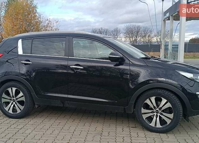 Черный Киа Sportage, объемом двигателя 1.7 л и пробегом 167 тыс. км за 12800 $, фото 3 на Automoto.ua