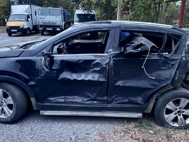 Черный Киа Sportage, объемом двигателя 2 л и пробегом 130 тыс. км за 2013 $, фото 3 на Automoto.ua