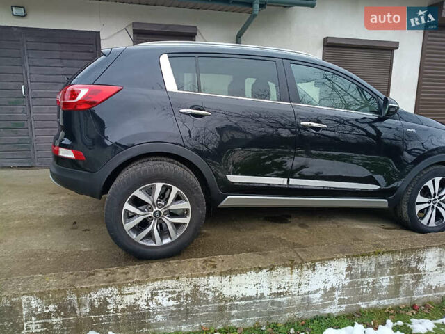Черный Киа Sportage, объемом двигателя 2 л и пробегом 209 тыс. км за 14599 $, фото 5 на Automoto.ua