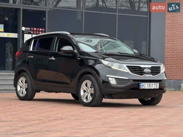 Черный Киа Sportage, объемом двигателя 2 л и пробегом 180 тыс. км за 13300 $, фото 1 на Automoto.ua