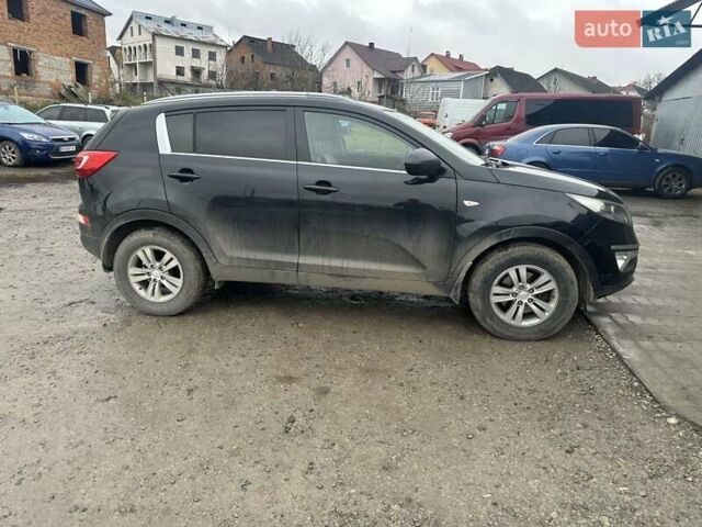 Черный Киа Sportage, объемом двигателя 1.69 л и пробегом 253 тыс. км за 10000 $, фото 4 на Automoto.ua