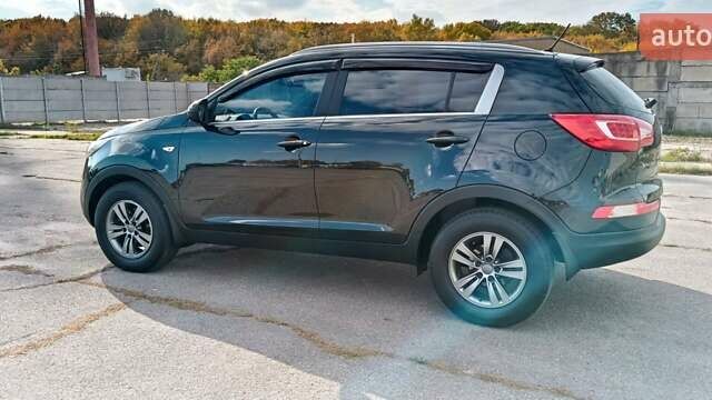 Черный Киа Sportage, объемом двигателя 1.7 л и пробегом 130 тыс. км за 13600 $, фото 10 на Automoto.ua