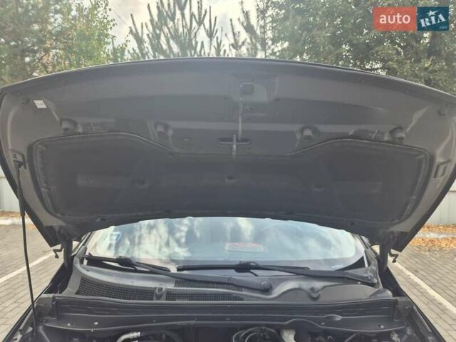 Чорний Кіа Sportage, об'ємом двигуна 2 л та пробігом 174 тис. км за 16799 $, фото 37 на Automoto.ua