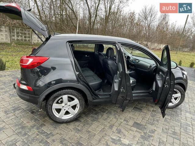 Черный Киа Sportage, объемом двигателя 1.6 л и пробегом 198 тыс. км за 12600 $, фото 7 на Automoto.ua