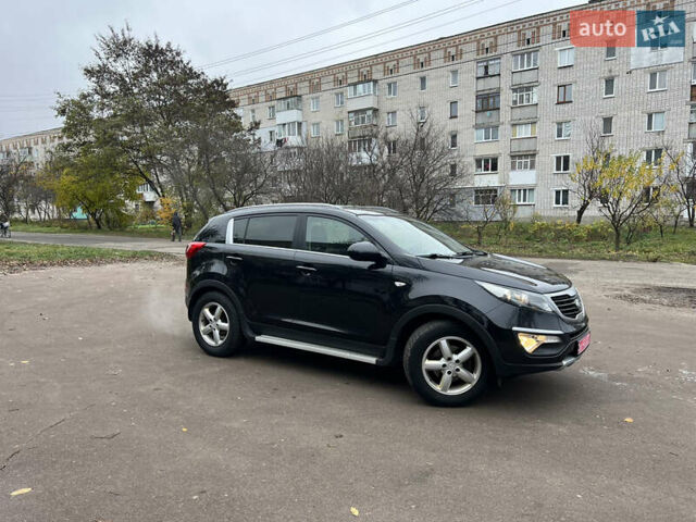 Черный Киа Sportage, объемом двигателя 1.6 л и пробегом 185 тыс. км за 11900 $, фото 5 на Automoto.ua