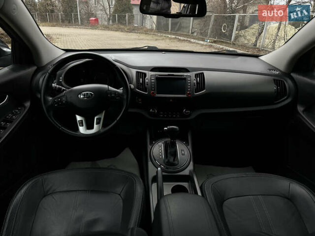 Чорний Кіа Sportage, об'ємом двигуна 2 л та пробігом 225 тис. км за 14500 $, фото 28 на Automoto.ua