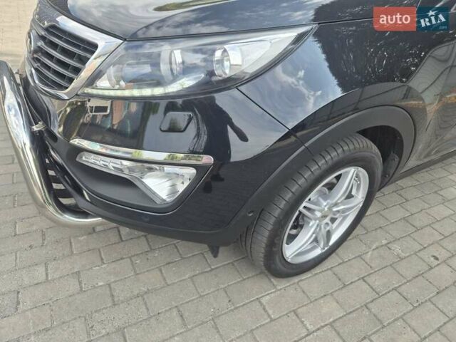 Чорний Кіа Sportage, об'ємом двигуна 2 л та пробігом 174 тис. км за 16799 $, фото 32 на Automoto.ua