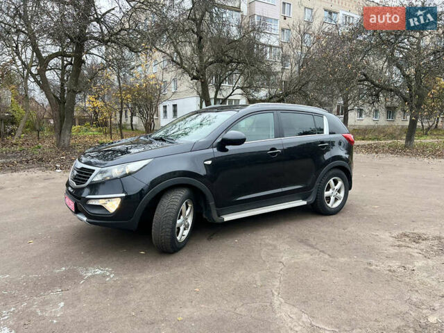Черный Киа Sportage, объемом двигателя 1.6 л и пробегом 185 тыс. км за 11900 $, фото 1 на Automoto.ua