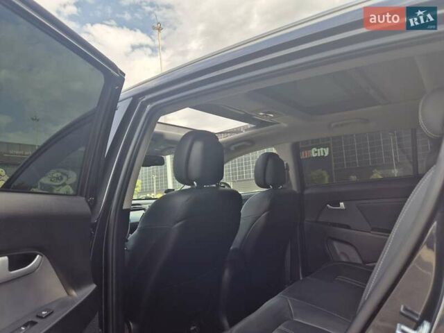 Чорний Кіа Sportage, об'ємом двигуна 2 л та пробігом 174 тис. км за 16799 $, фото 41 на Automoto.ua