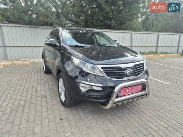 Чорний Кіа Sportage, об'ємом двигуна 2 л та пробігом 174 тис. км за 16799 $, фото 21 на Automoto.ua