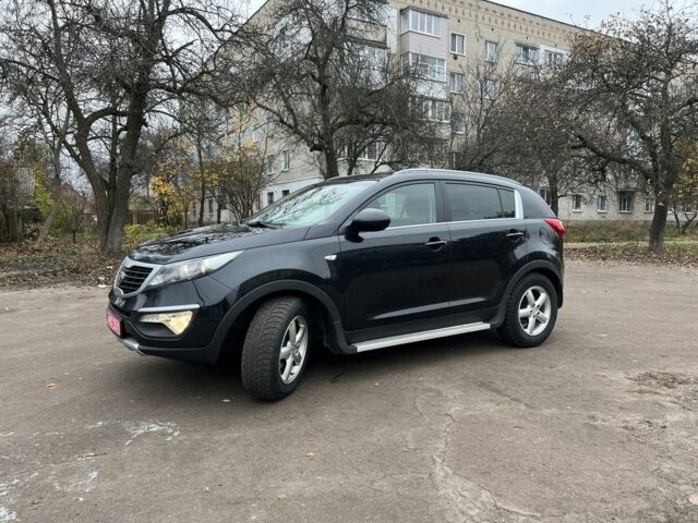 Черный Киа Sportage, объемом двигателя 1.6 л и пробегом 185 тыс. км за 11700 $, фото 1 на Automoto.ua
