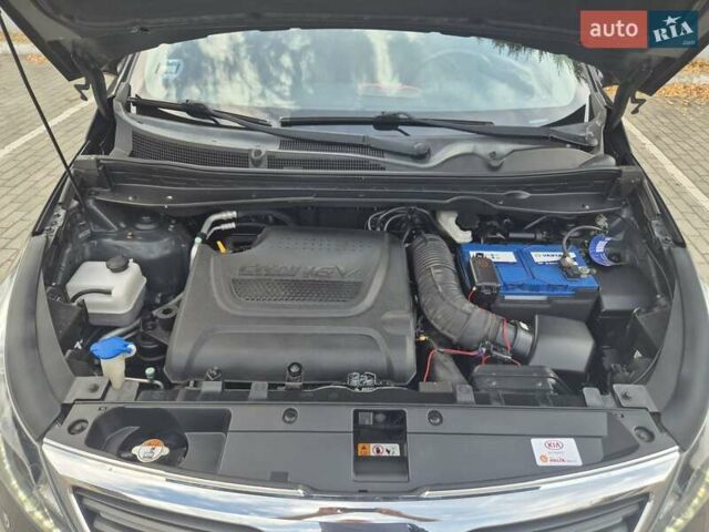 Чорний Кіа Sportage, об'ємом двигуна 2 л та пробігом 174 тис. км за 16799 $, фото 38 на Automoto.ua