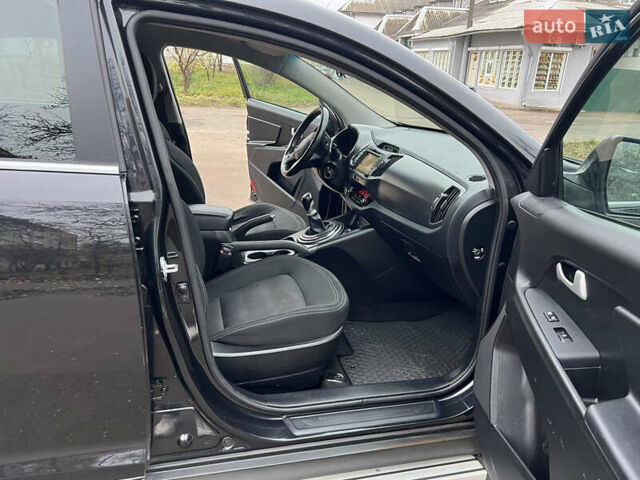 Черный Киа Sportage, объемом двигателя 1.6 л и пробегом 185 тыс. км за 11900 $, фото 23 на Automoto.ua