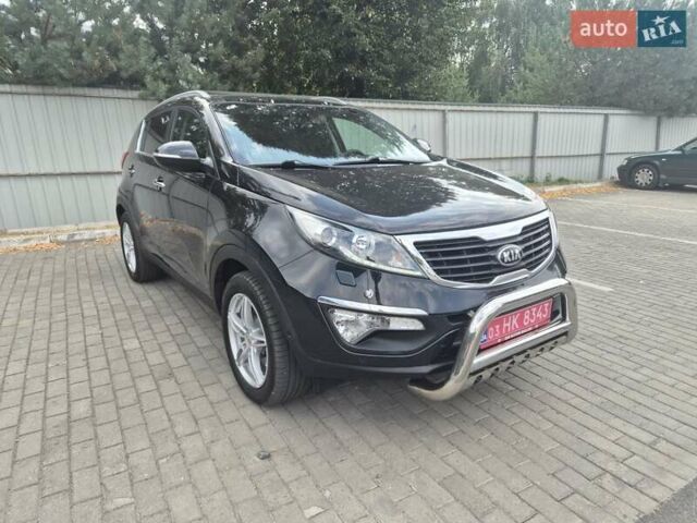 Чорний Кіа Sportage, об'ємом двигуна 2 л та пробігом 174 тис. км за 16799 $, фото 22 на Automoto.ua