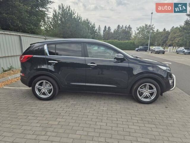 Чорний Кіа Sportage, об'ємом двигуна 2 л та пробігом 174 тис. км за 16799 $, фото 15 на Automoto.ua