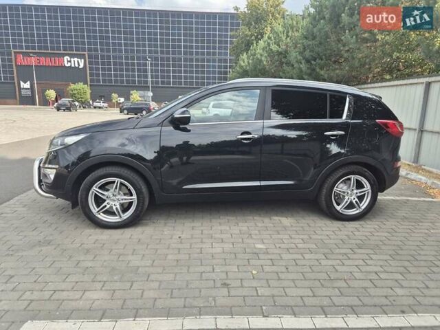 Чорний Кіа Sportage, об'ємом двигуна 2 л та пробігом 174 тис. км за 16799 $, фото 3 на Automoto.ua