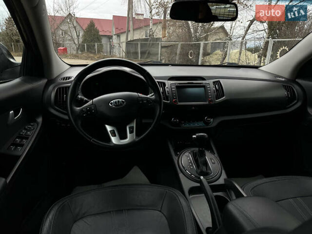 Чорний Кіа Sportage, об'ємом двигуна 2 л та пробігом 225 тис. км за 14500 $, фото 27 на Automoto.ua