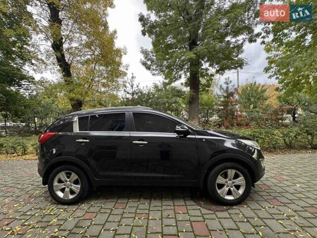 Чорний Кіа Sportage, об'ємом двигуна 2 л та пробігом 160 тис. км за 14500 $, фото 7 на Automoto.ua