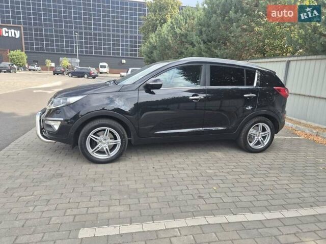 Чорний Кіа Sportage, об'ємом двигуна 2 л та пробігом 174 тис. км за 16799 $, фото 4 на Automoto.ua