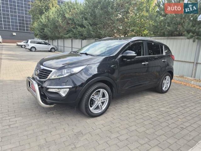Чорний Кіа Sportage, об'ємом двигуна 2 л та пробігом 174 тис. км за 16799 $, фото 5 на Automoto.ua