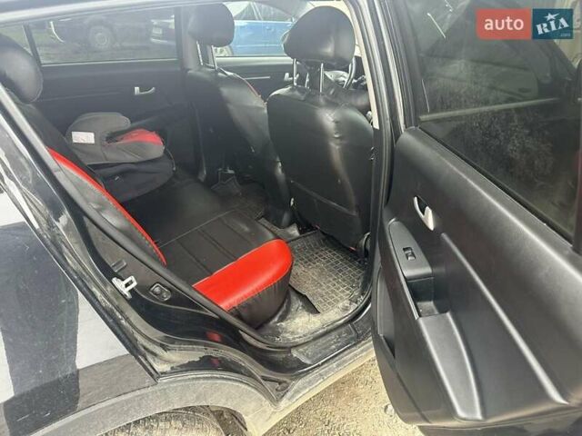 Черный Киа Sportage, объемом двигателя 1.69 л и пробегом 253 тыс. км за 10000 $, фото 1 на Automoto.ua