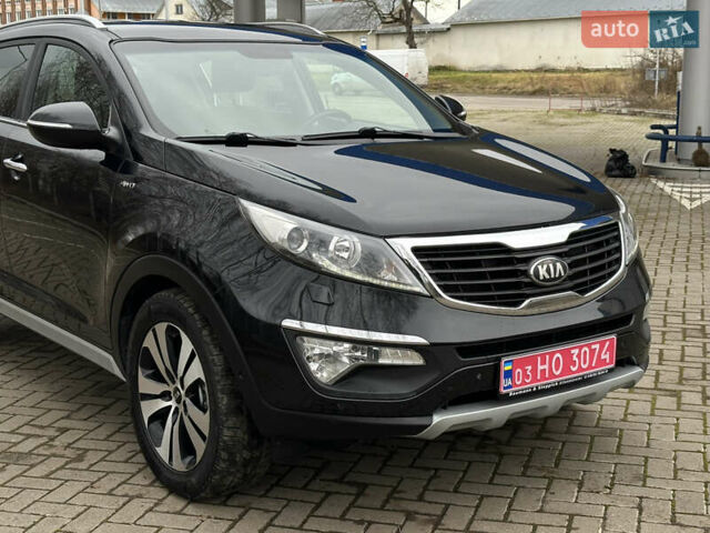Чорний Кіа Sportage, об'ємом двигуна 2 л та пробігом 225 тис. км за 14500 $, фото 4 на Automoto.ua