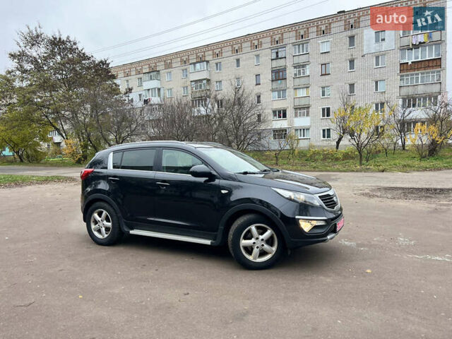 Черный Киа Sportage, объемом двигателя 1.6 л и пробегом 185 тыс. км за 11900 $, фото 6 на Automoto.ua