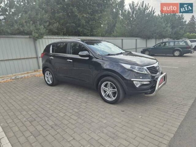 Чорний Кіа Sportage, об'ємом двигуна 2 л та пробігом 174 тис. км за 16799 $, фото 16 на Automoto.ua