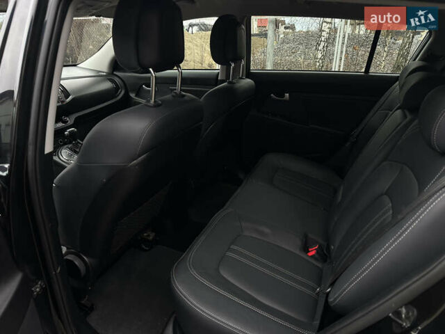 Чорний Кіа Sportage, об'ємом двигуна 2 л та пробігом 225 тис. км за 14500 $, фото 25 на Automoto.ua
