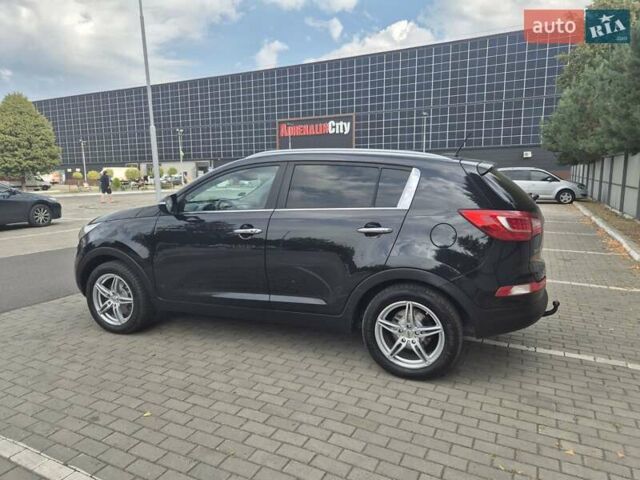 Чорний Кіа Sportage, об'ємом двигуна 2 л та пробігом 174 тис. км за 16799 $, фото 9 на Automoto.ua