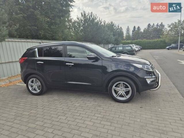 Чорний Кіа Sportage, об'ємом двигуна 2 л та пробігом 174 тис. км за 16799 $, фото 19 на Automoto.ua