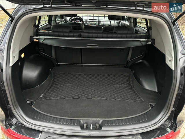 Чорний Кіа Sportage, об'ємом двигуна 2 л та пробігом 225 тис. км за 14500 $, фото 38 на Automoto.ua