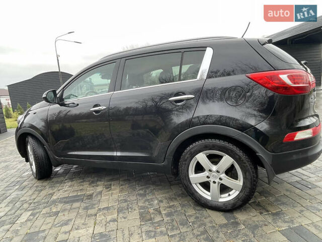 Черный Киа Sportage, объемом двигателя 1.6 л и пробегом 198 тыс. км за 12600 $, фото 3 на Automoto.ua