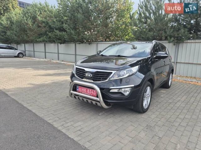 Чорний Кіа Sportage, об'ємом двигуна 2 л та пробігом 174 тис. км за 16799 $, фото 29 на Automoto.ua