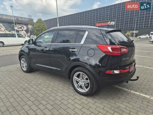 Чорний Кіа Sportage, об'ємом двигуна 2 л та пробігом 174 тис. км за 16799 $, фото 8 на Automoto.ua