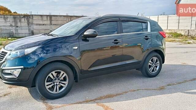 Черный Киа Sportage, объемом двигателя 1.7 л и пробегом 130 тыс. км за 13600 $, фото 11 на Automoto.ua