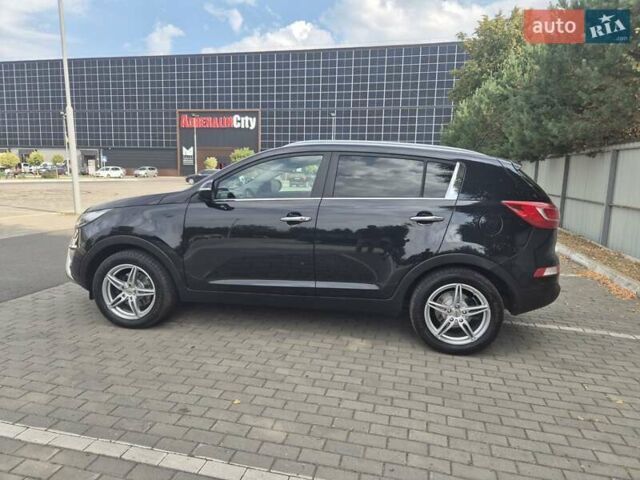 Чорний Кіа Sportage, об'ємом двигуна 2 л та пробігом 174 тис. км за 16799 $, фото 6 на Automoto.ua