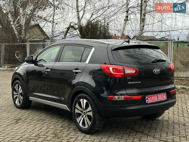 Чорний Кіа Sportage, об'ємом двигуна 2 л та пробігом 225 тис. км за 14500 $, фото 18 на Automoto.ua