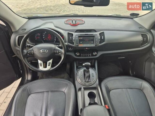 Чорний Кіа Sportage, об'ємом двигуна 2 л та пробігом 174 тис. км за 16799 $, фото 33 на Automoto.ua