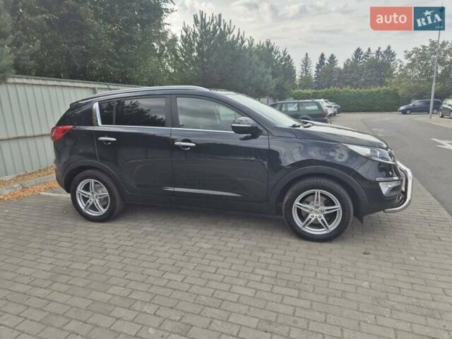 Чорний Кіа Sportage, об'ємом двигуна 2 л та пробігом 174 тис. км за 16799 $, фото 20 на Automoto.ua